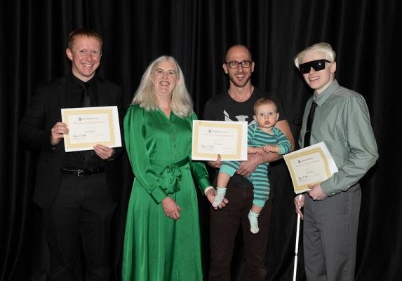 Dean Webb with the three College of Liberal Arts winners of Distinction in Creativity